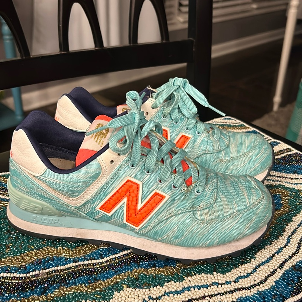 Wore a few times, super cute, they are teal and bright orange Nwith white trim.